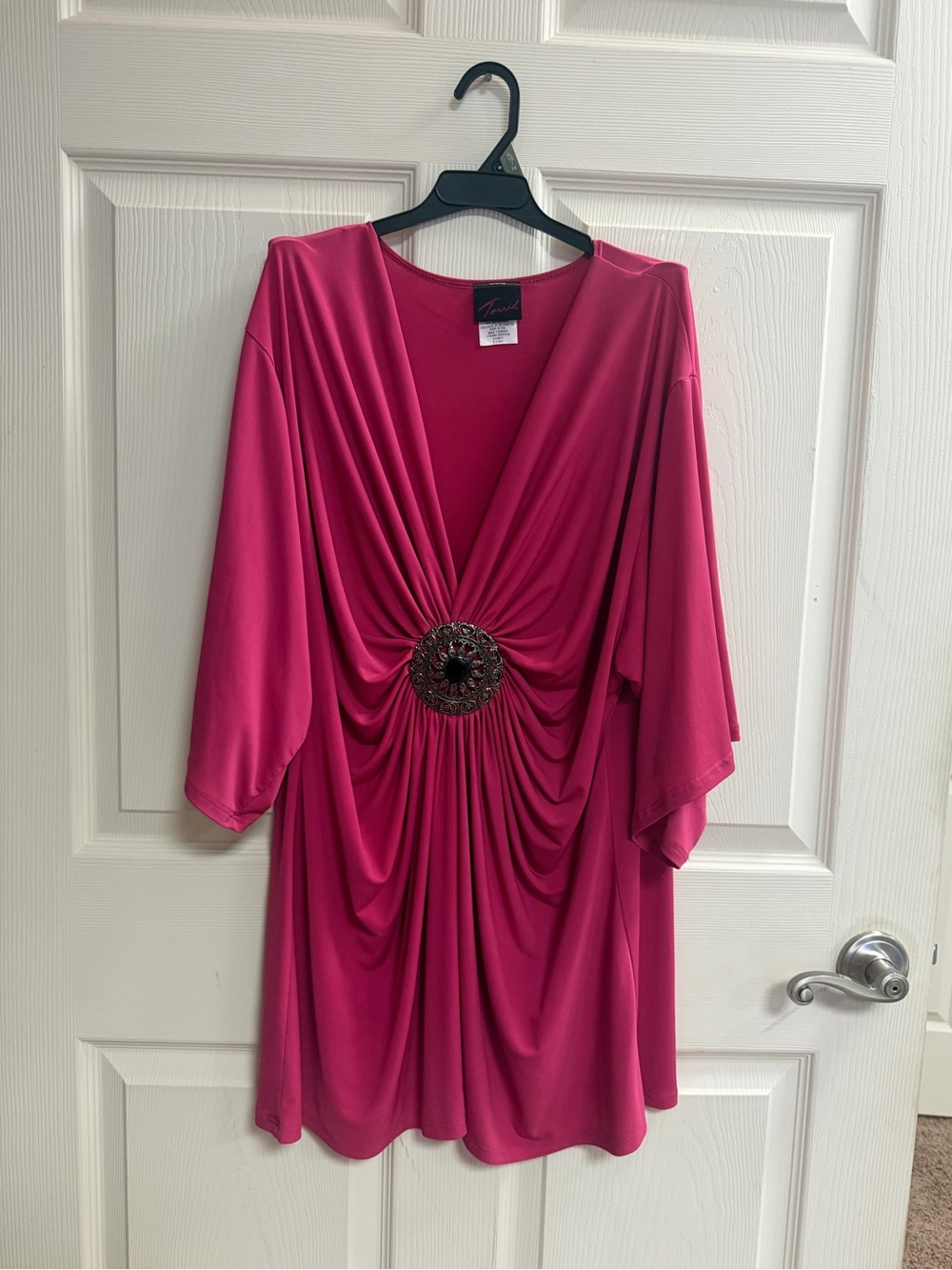 Vintage Torrid pink blouse with a decorative black button detail